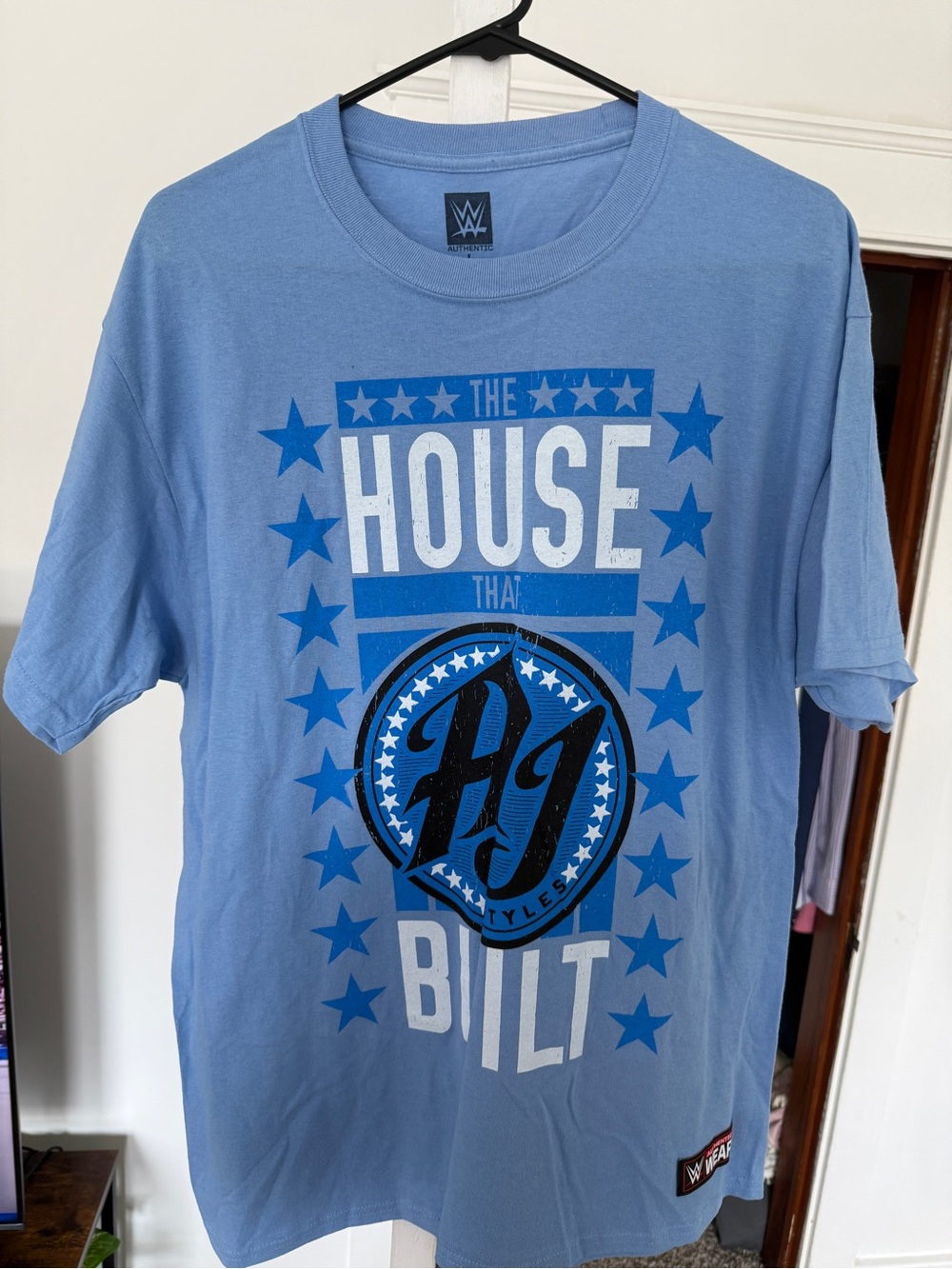 WWE Blue AJ Styles Graphic Tee with White and Dark Blue Accents
